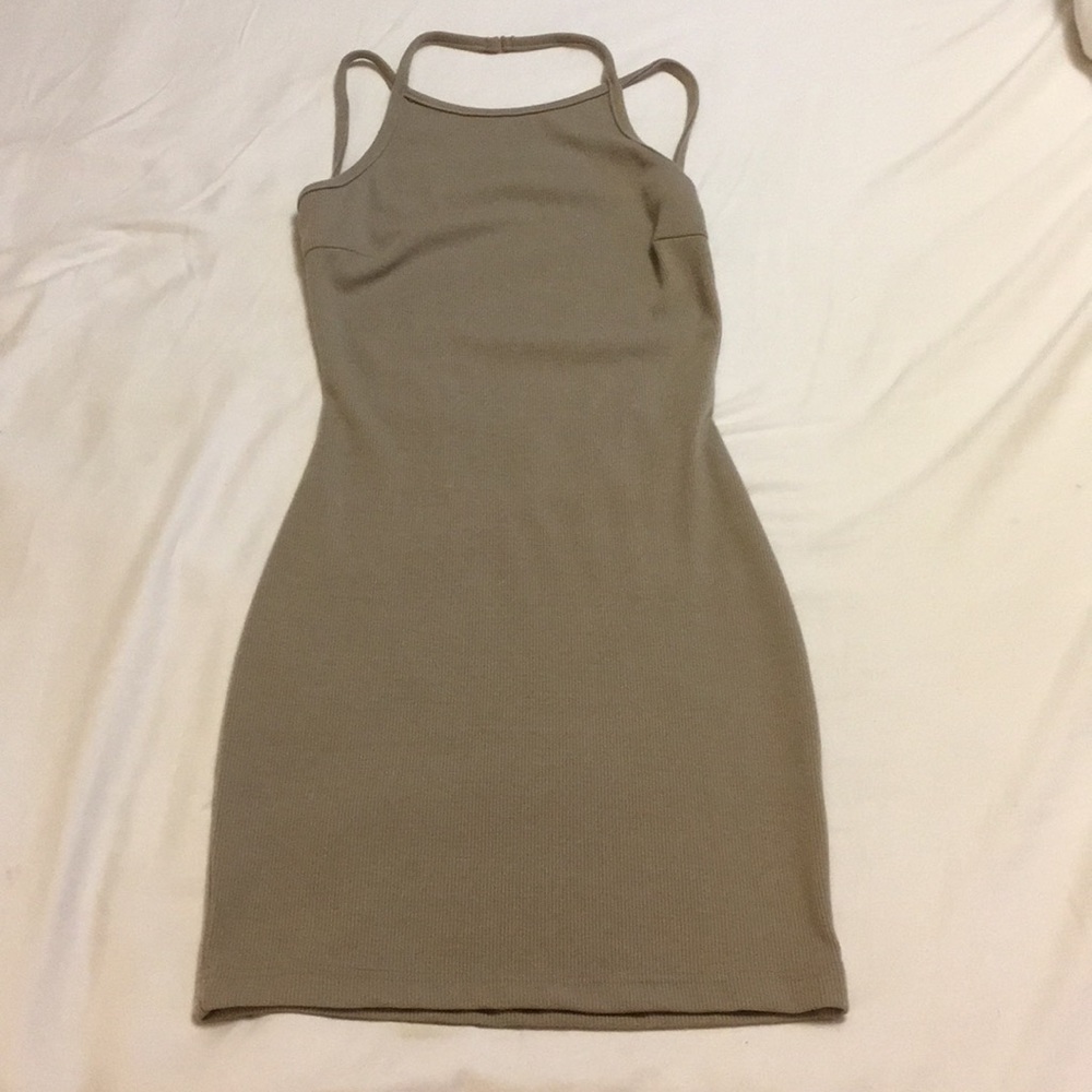 Low cut back, mid thigh high dress.